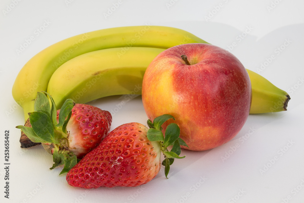Fruit composition with fresh and big strawberries with apple and banana isolated on white background Fruit composition with fresh and big strawberries with apple and banana isolated on white background