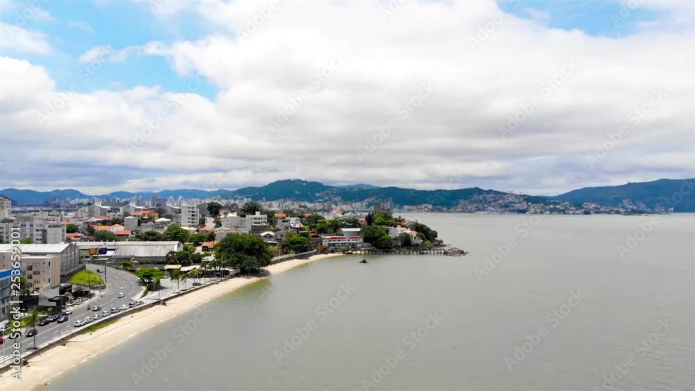 Aerial view of the the houses and building on the island of Floripa in Brazil - Crane Down Aerial view of the the houses and building on the island of Floripa in Brazil - Crane Down
