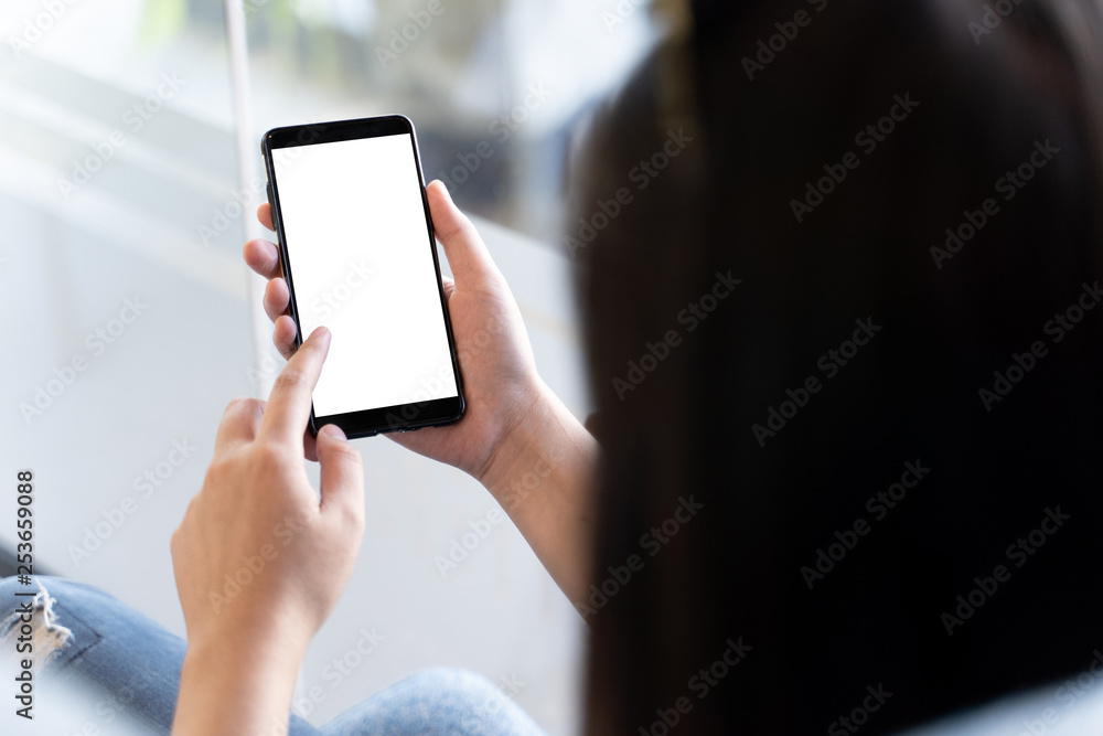 Woman using tablet Mockup for your own content  at home blank empty screen