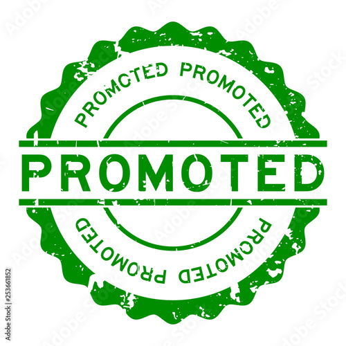 Grunge green promoted word round rubber seal stamp on white background