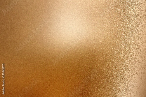 Shiny rough brown metallic wall, abstract texture background