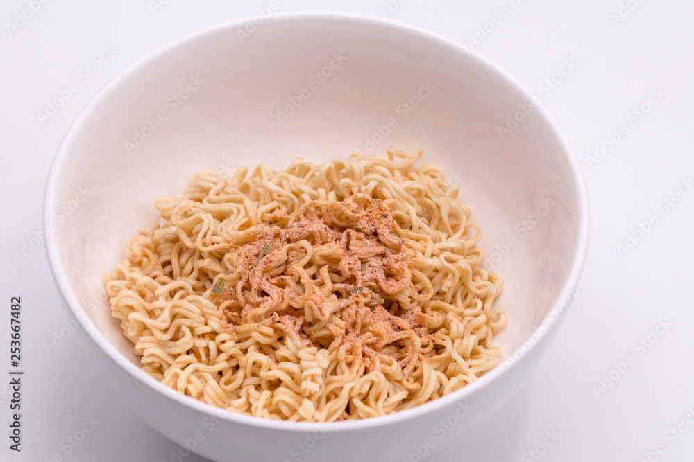 Close up dried noodles on white background. Close up dried noodles on white background.