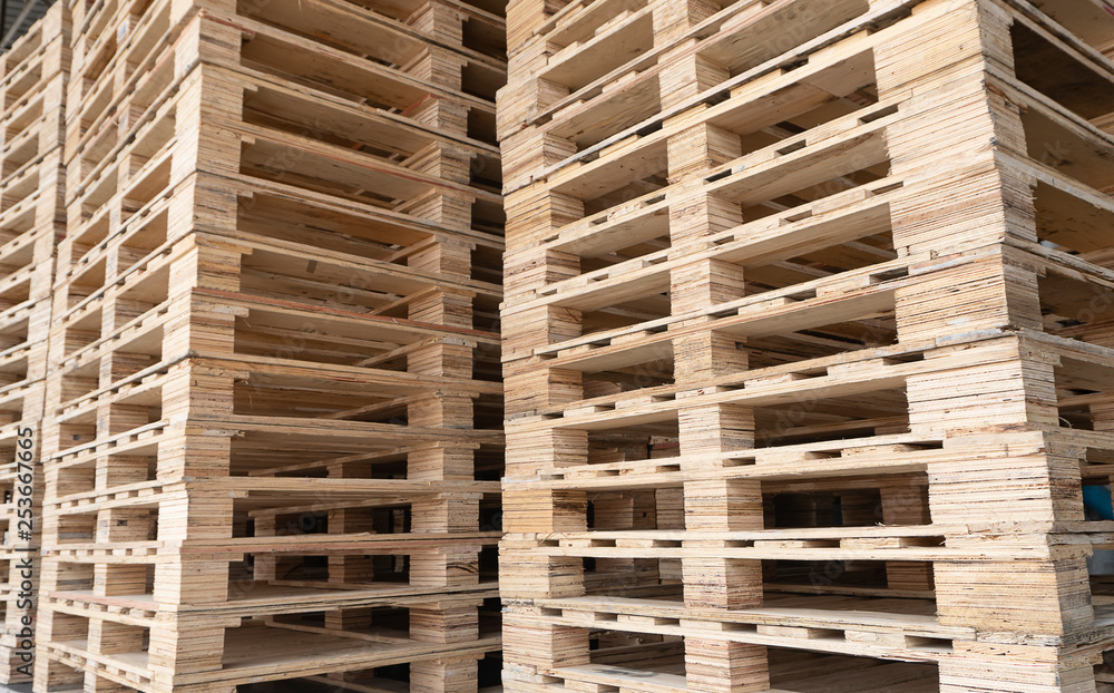 stack of wooden pallets for industrial and logistics. stack of wooden pallets for industrial and logistics.