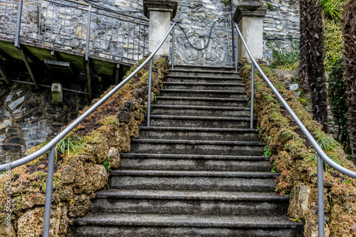 Fototapeta Naklejka Na Ścianę i Meble -  Italy, Varenna, Lake Como, a close up of a stone steps