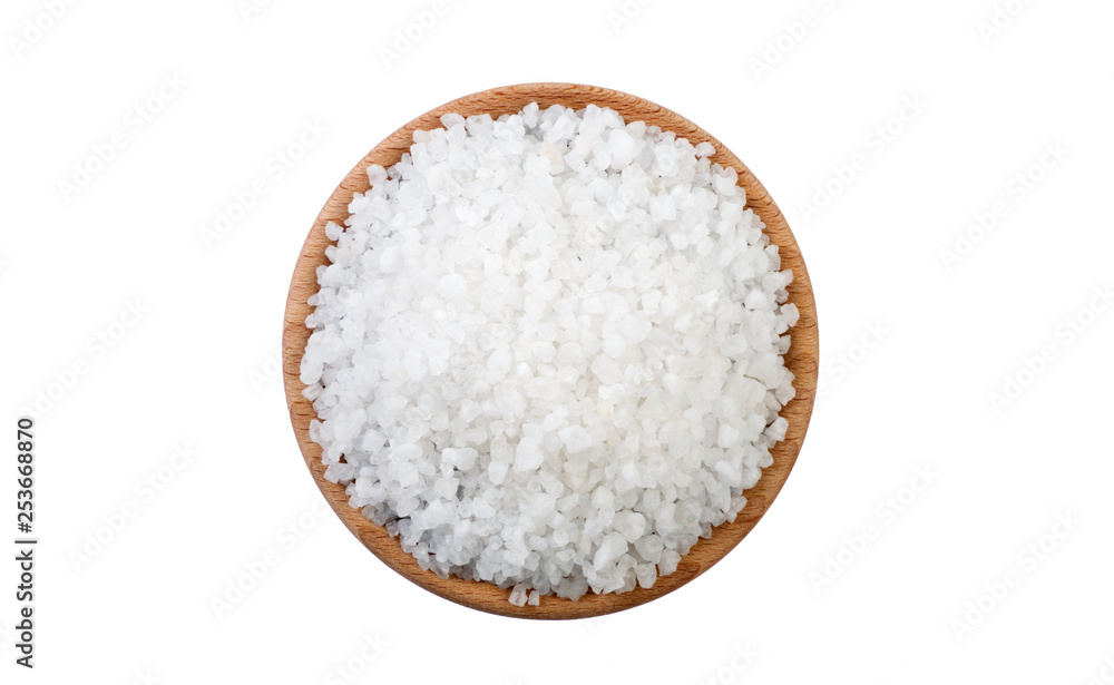 white salt crystals in wooden bowl isolated on white background. Spices and food ingredients. white salt crystals in wooden bowl isolated on white background. Spices and food ingredients.