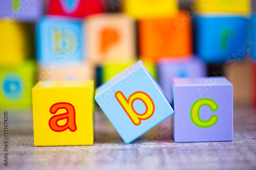 Colorful wooden alphabet; a...
