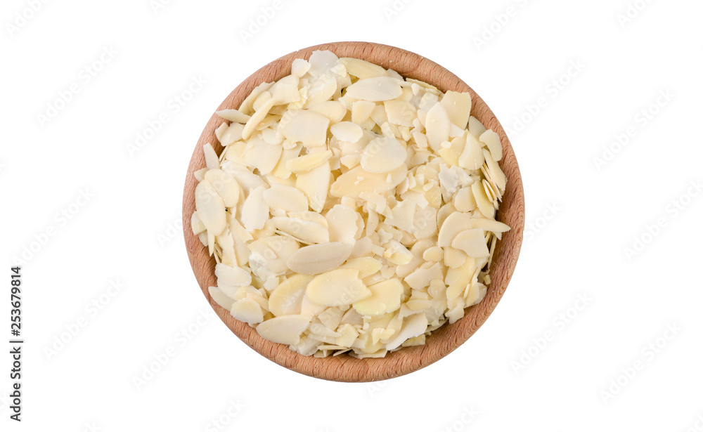 almond in wooden bowl isolated on white background. Spices and food ingredients. almond in wooden bowl isolated on white background. Spices and food ingredients.