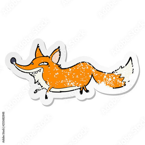 distressed sticker of a cartoon sly fox