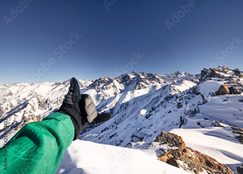 Climber at mountain peak © pikoso.kz