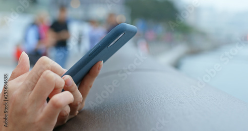 Photography Woman use of mobile phone at outdoor
