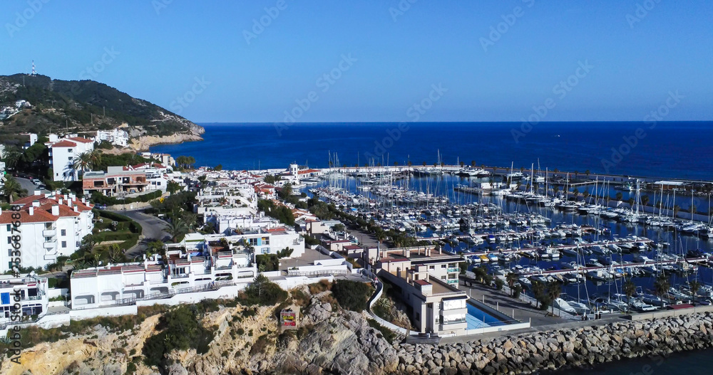 Fototapeta premium Sitges. Aerial view by Drone of coastal village in Barcelona. Spain