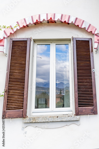 Italy  Varenna  Lake Como  window with a blinder on top