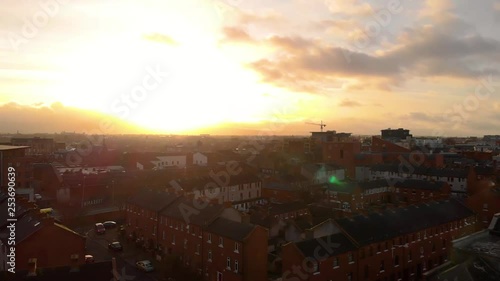 Wallpaper Mural Drone moving up and sidewards to reveal the city with the sun rising in the background. Torontodigital.ca