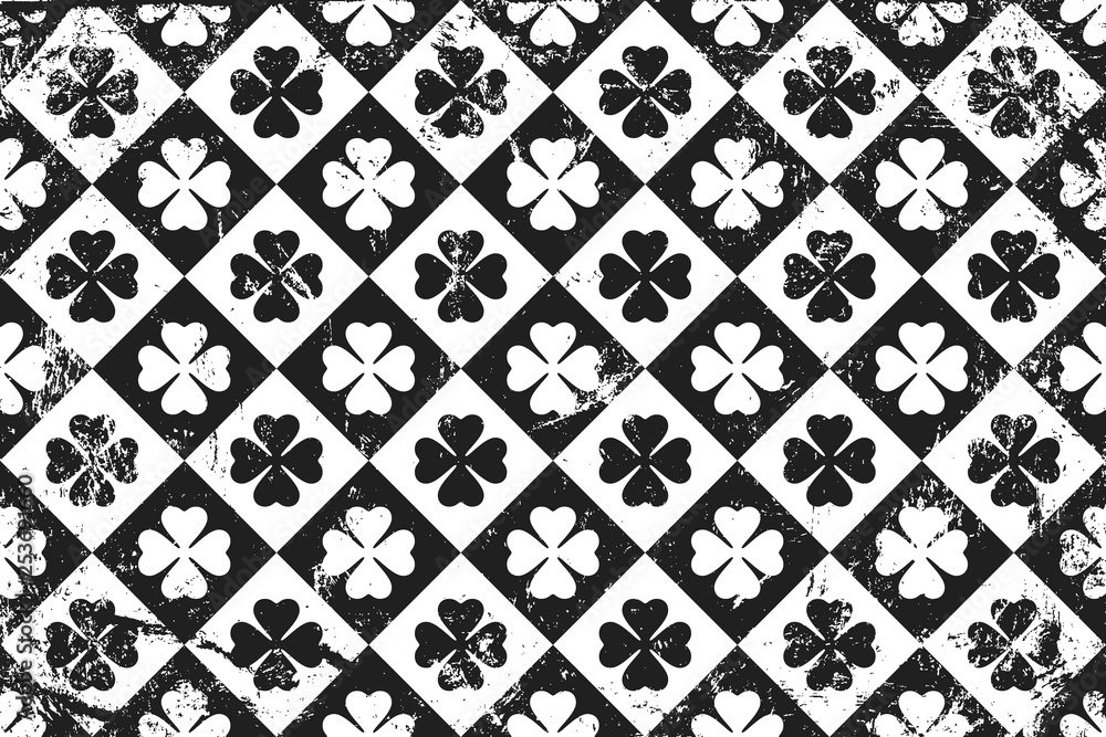 Grunge pattern with signs of clovers. Horizontal black and white backdrop.