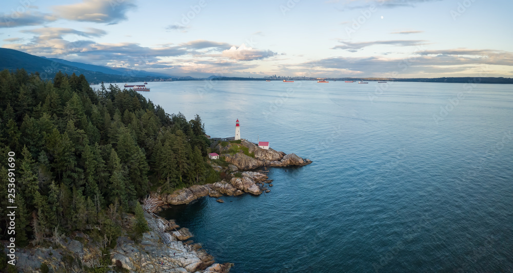 Aerial view of a beautiful Canadian Landscape during a cloudy summer sunset. Taken in Lighthouse Park, Horseshoe Bay, North Vancouver, BC, Canada.