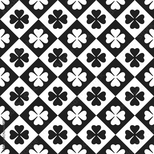 Seamless pattern with signs of clovers.
