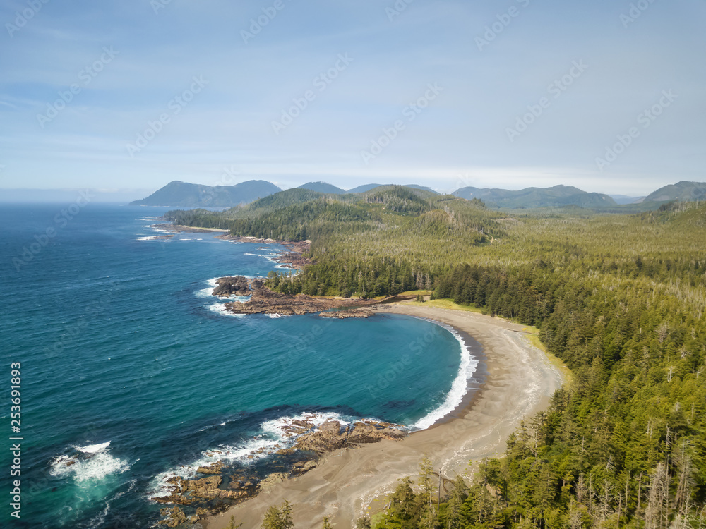 Beautiful aerial seascape view on the Pacific Ocean Coast during a vibrant summer day. Taken in Northern Vancouver Island, British Columbia, Canada.