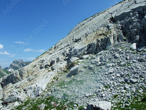 Alpine peak Silberplatten in mountain range Alpstein - Canton of St. Gallen, Switzerland photo