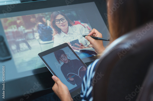 Photo of asia women are using electronic tools