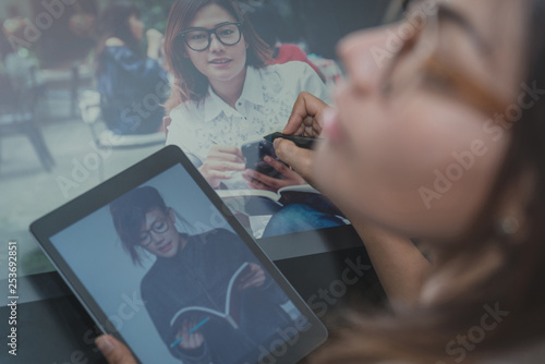 Photo of asia  women are using  electronic