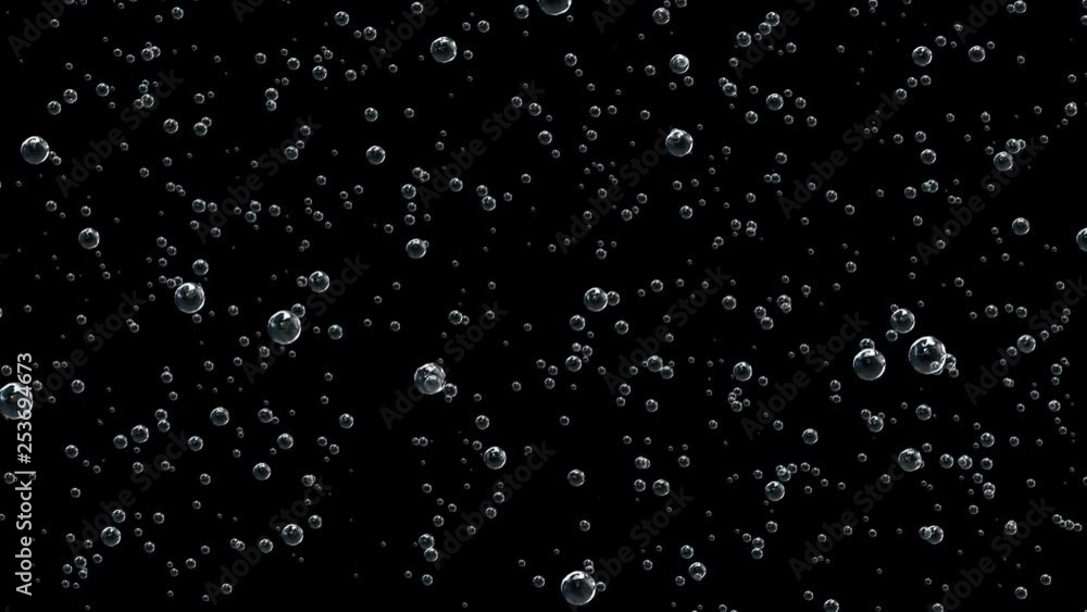 Beautiful appearance of champagne bubbles on the surface of the glass.In a glass with champagne fill champagne with wine on a black background. Slow motion Beautiful appearance of champagne bubbles on the surface of the glass.In a glass with champagne fill champagne with wine on a black background. Slow motion