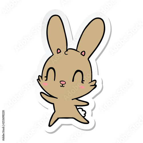 sticker of a cute cartoon rabbit dancing
