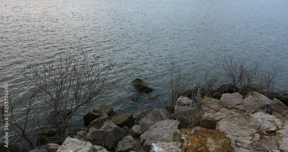 Rocky shoreline on Lake Lewisville in Texas. Rocky shoreline on Lake Lewisville in Texas.
