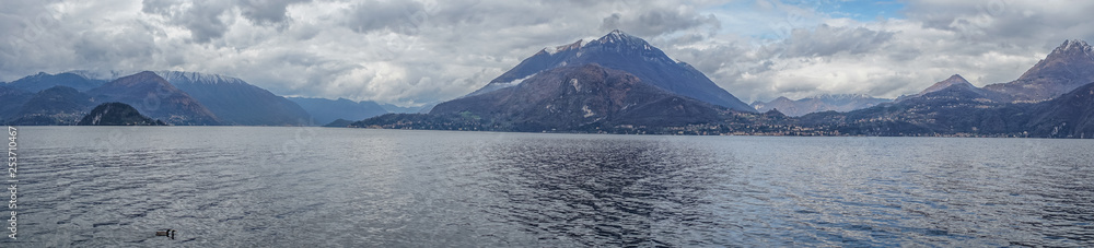 Italy, Varenna, Lake Como, a large body of water with Milford Sound in the background