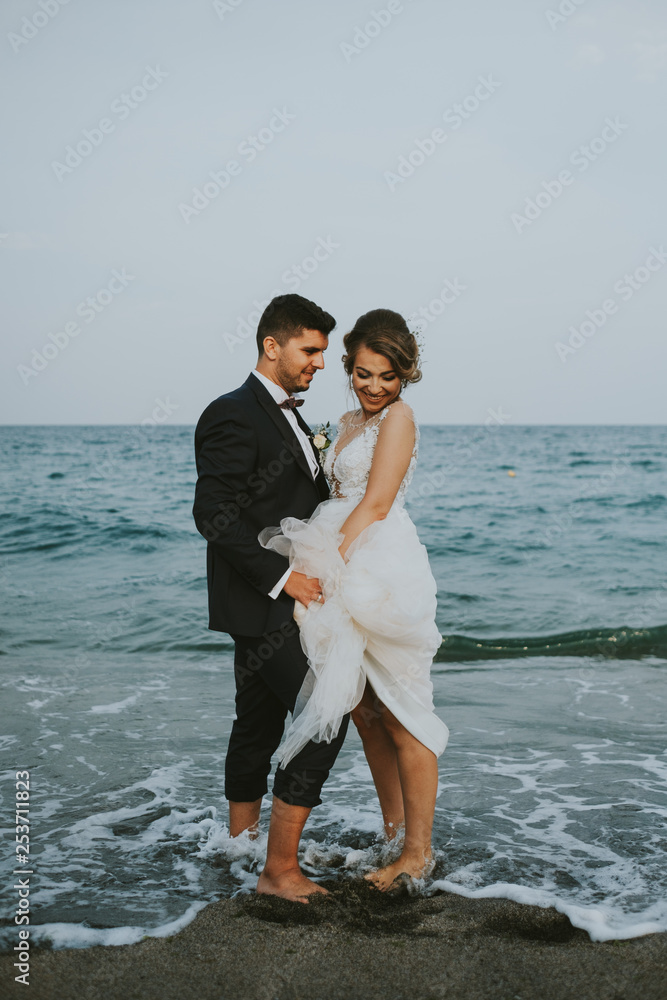 bride and groom on the beach