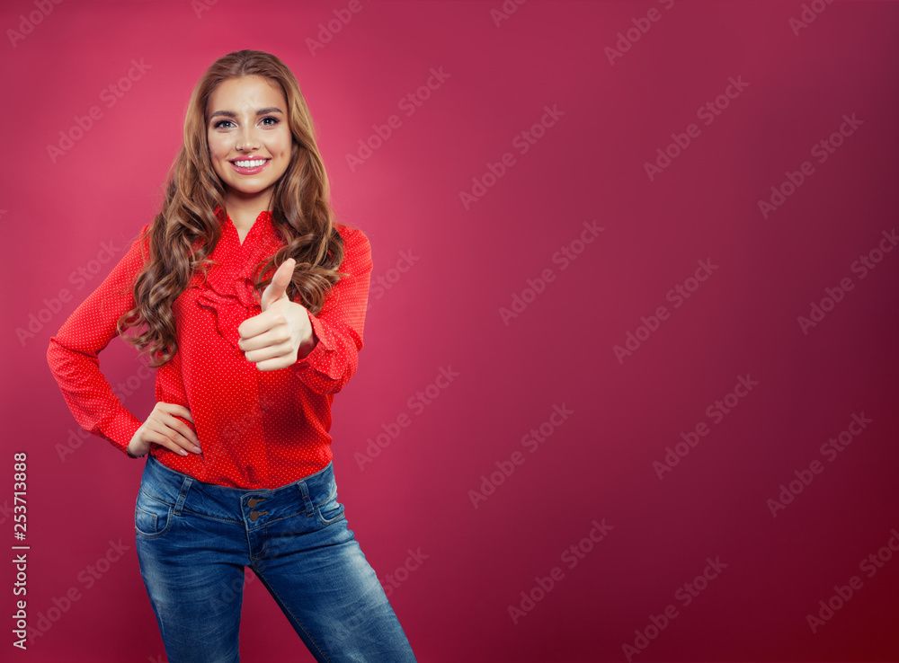 Portrait of young cheerful woman showing thumb up on bright pink banner background with copy space. Happy student girl with thumb up gesture Portrait of young cheerful woman showing thumb up on bright pink banner background with copy space. Happy student girl with thumb up gesture