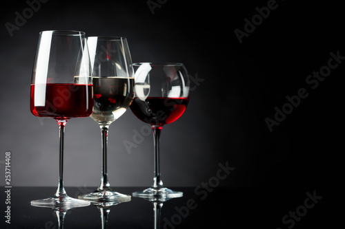Glasses of red, pink and white wine.