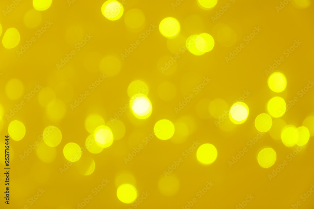 Blurred view of shiny gold lights. Bokeh effect Blurred view of shiny gold lights. Bokeh effect