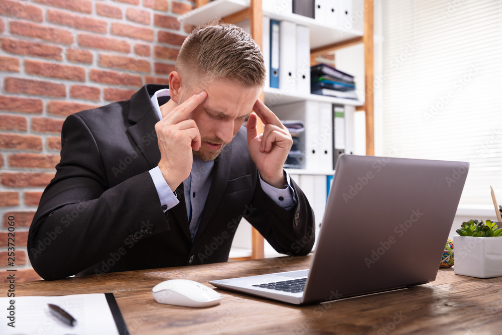 Man Suffering From Headache Man Suffering From Headache