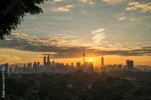 Photography Majestic view of Kuala Lumpur cityscape during sunrise.