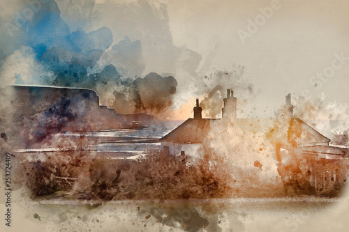 Fotografia Watercolour painting of Sunrise over coastguard cottages at Seaford Head with Se
