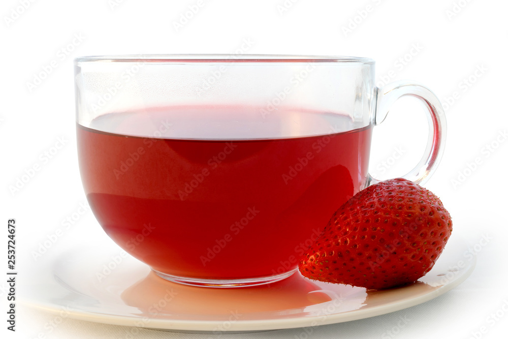 Glass cup of hot aromatic red tea with strawberry Glass cup of hot aromatic red tea with strawberry