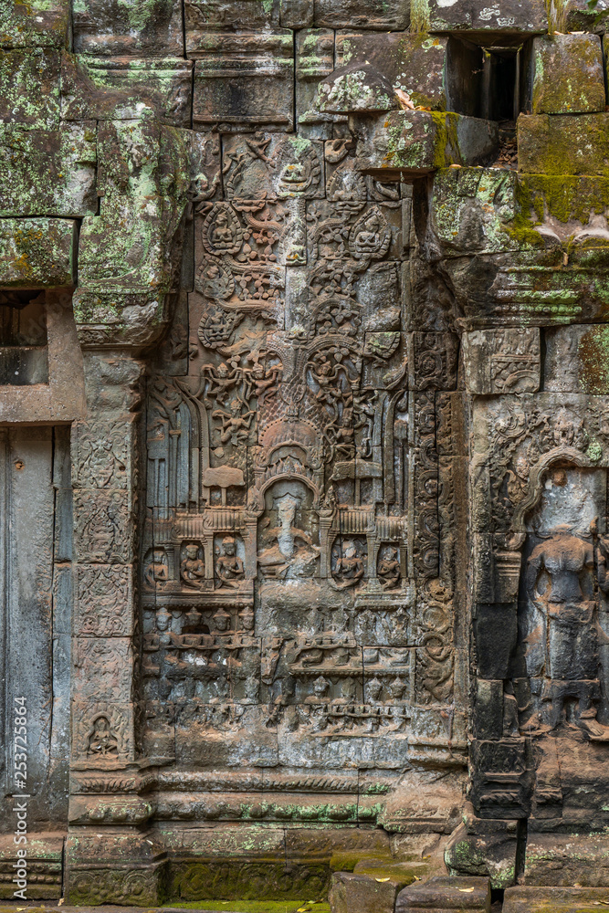 Buddha relief on the gopuram of Ta Prohm temple, Cambodia