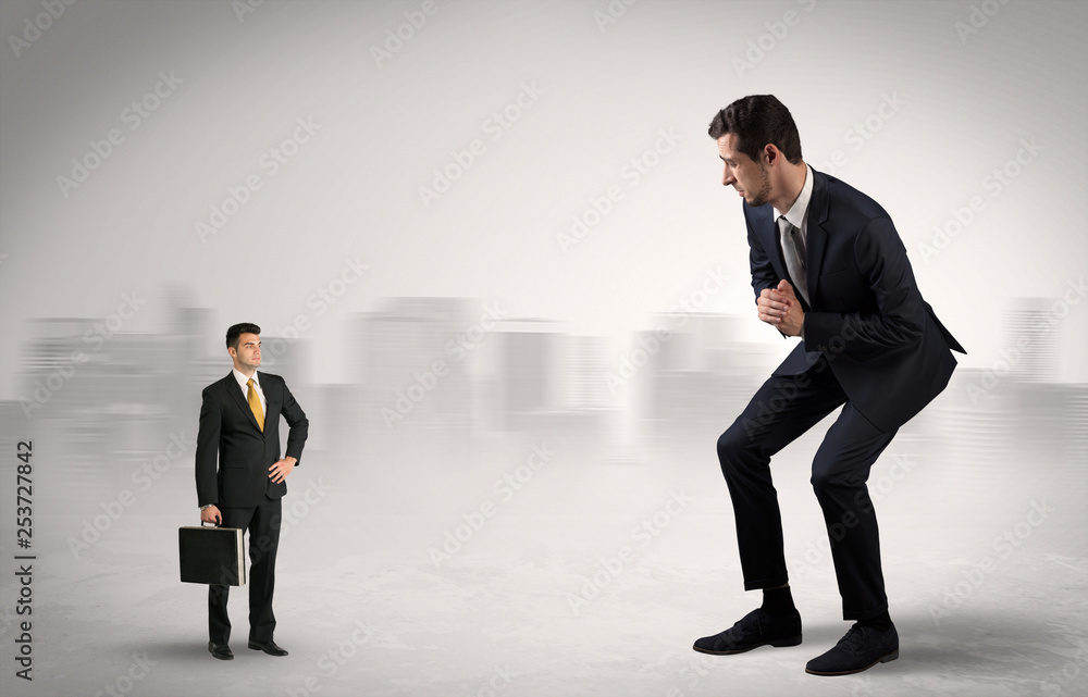 Giant businessman being afraid of small serious executor with suitcase
Giant businessman being afraid of small serious executor with suitcase