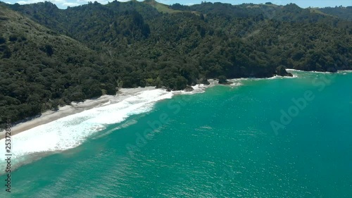 Orokawa Bay, New Zealand Drone pan of the beach photo