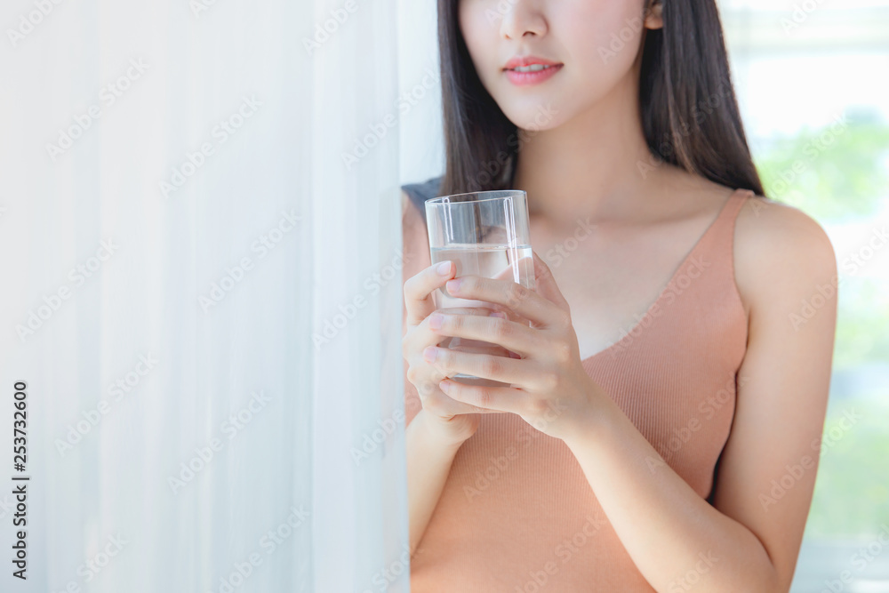 Close up , healthy woman drinking fresh water of glass , Beauty healthcare diet and drinks lifestyle concept. Close up , healthy woman drinking fresh water of glass , Beauty healthcare diet and drinks lifestyle concept.