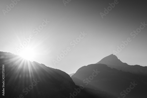 Sun in the mountains. Black and white
