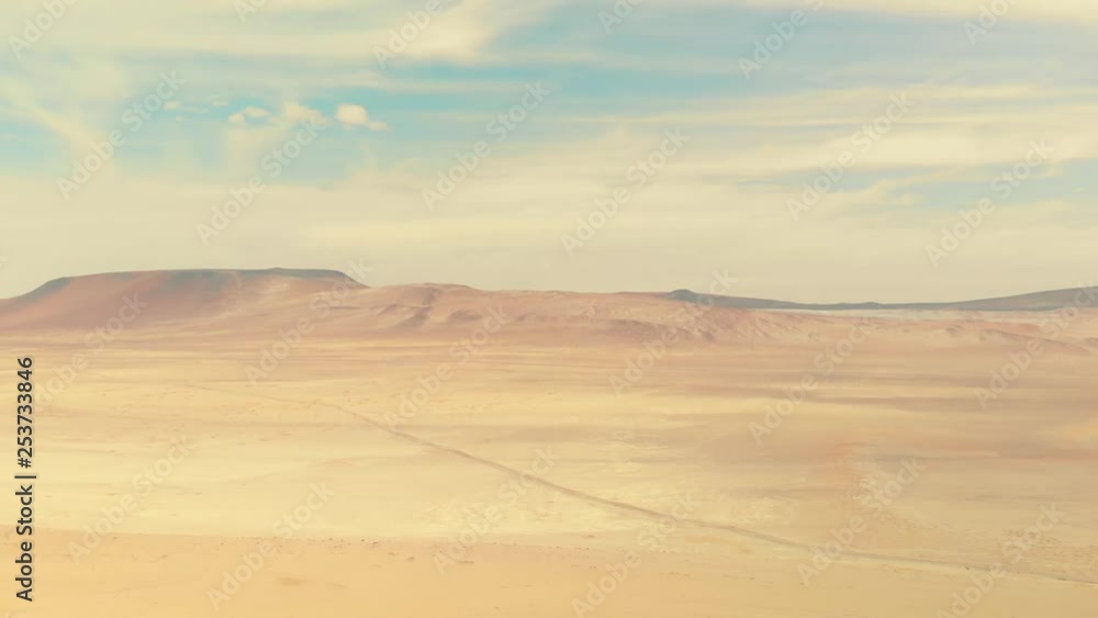 Aerial panoramic view of a road in the Paracas desert at Paracas national parc, Peru. Aerial panoramic view of a road in the Paracas desert at Paracas national parc, Peru.