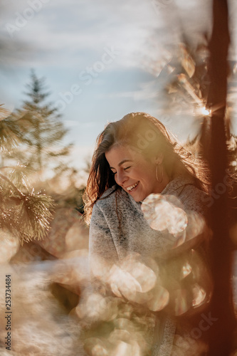 Woman enjoys a winter sunny day 