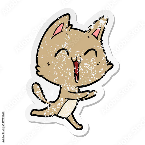 distressed sticker of a happy cartoon cat meowing