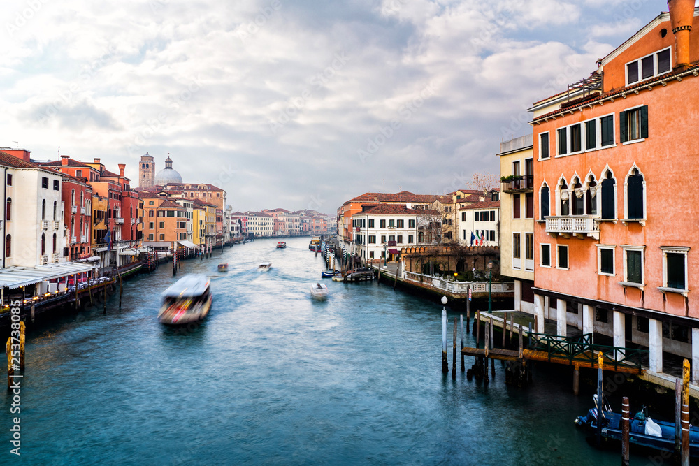 Famous Canal Grande with many boats in Venice, Italy.