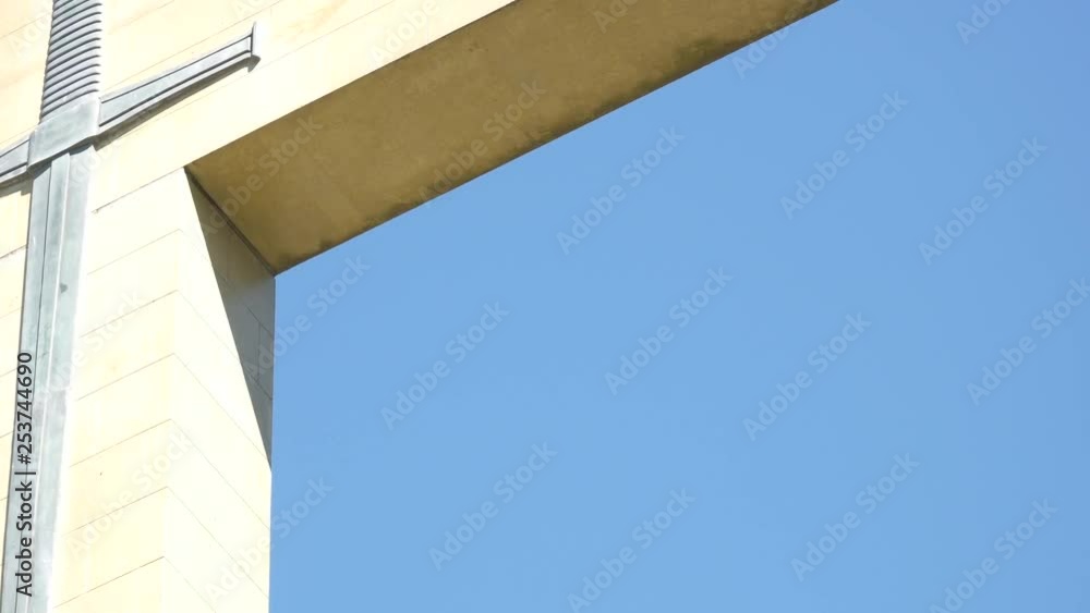 Close up of crucifix against bright blue sky, negative space Close up of crucifix against bright blue sky, negative space