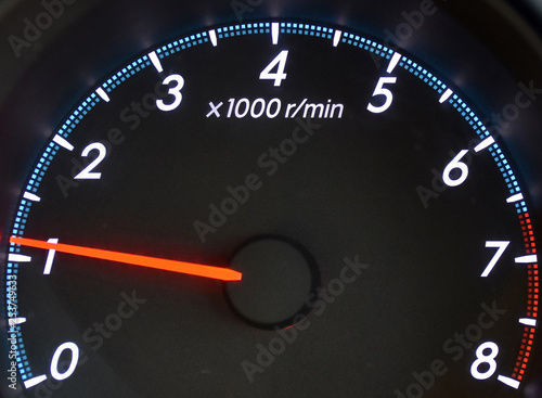 The tachometer of the vehicle. Close up