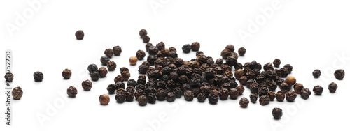 Black pepper grains isolated on white background