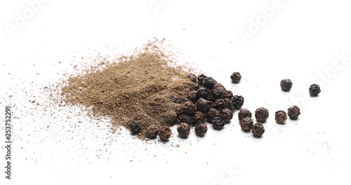 Black pepper grains and powder isolated on white background