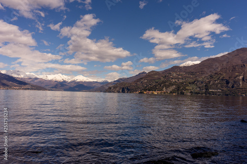 Italy, Bellagio, Lake Como, SCENIC VIEW OF SNOWCAPPED MOUNTAINS AGAINST BLUE SKY, Lombardy